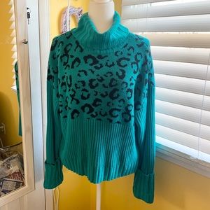 Green cheetah print turtleneck sweater